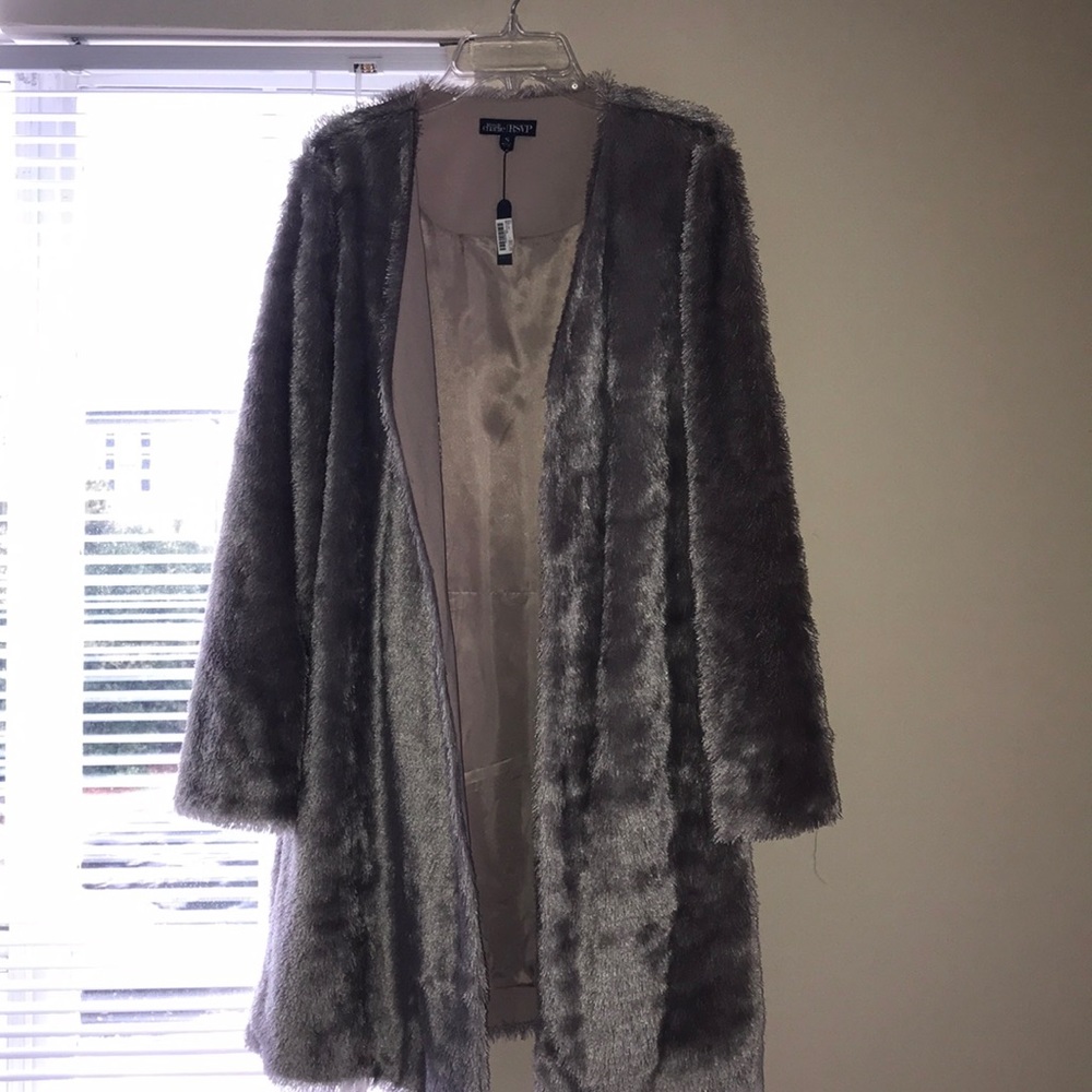 Stylish 100% polyester greatcoat.